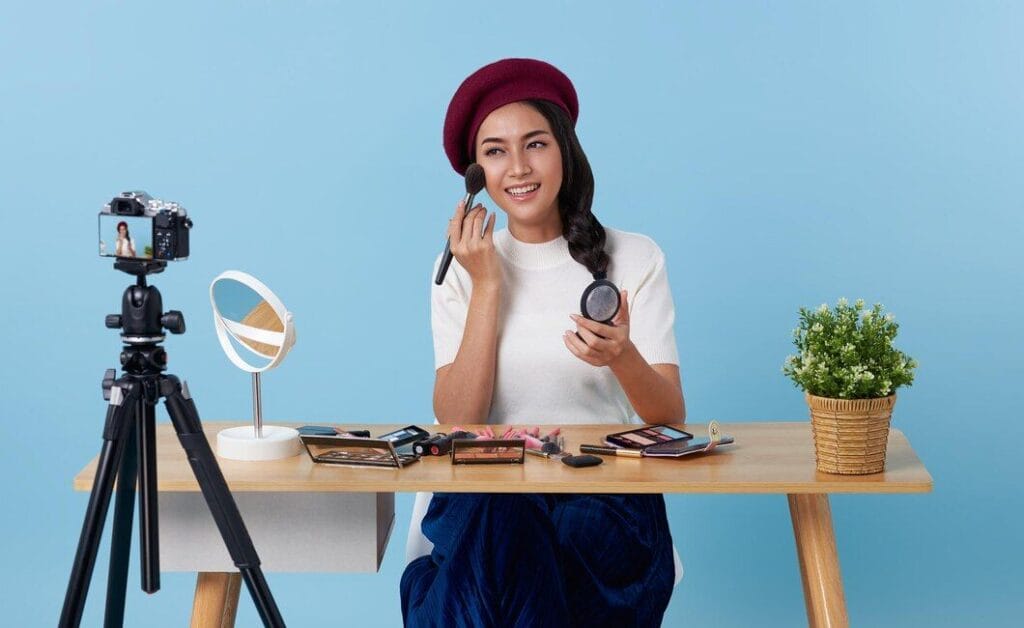 beauty blog happy asian makeup artist recording cosmetics product review showing her makeup 74952 3259 1da5290834 1